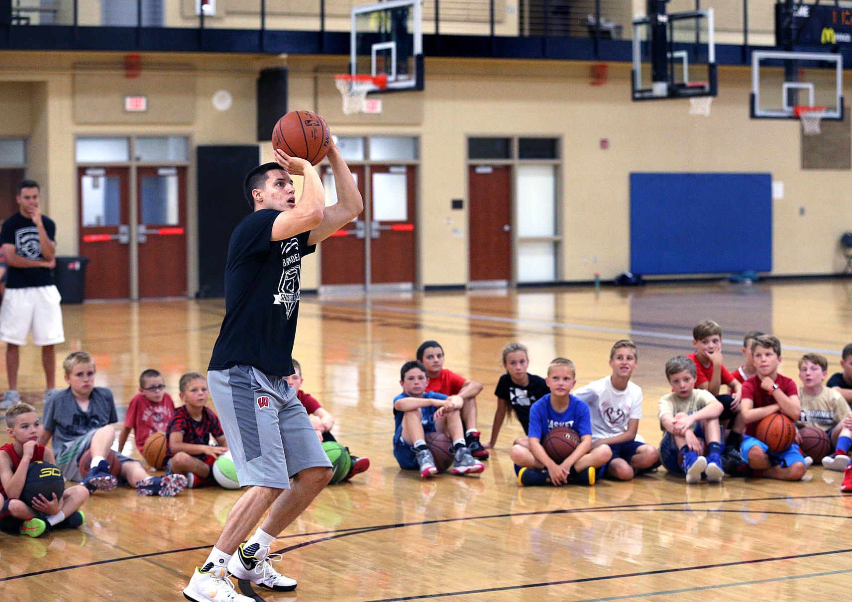 La Crosse Aquinas grad Bronson Koenig hosts basketball camp in hometown